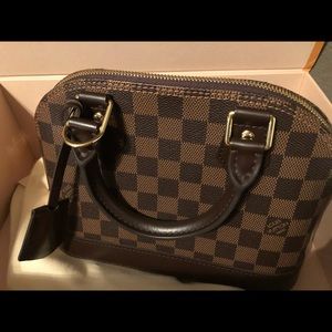 Louis Vuitton Alma BB handbag